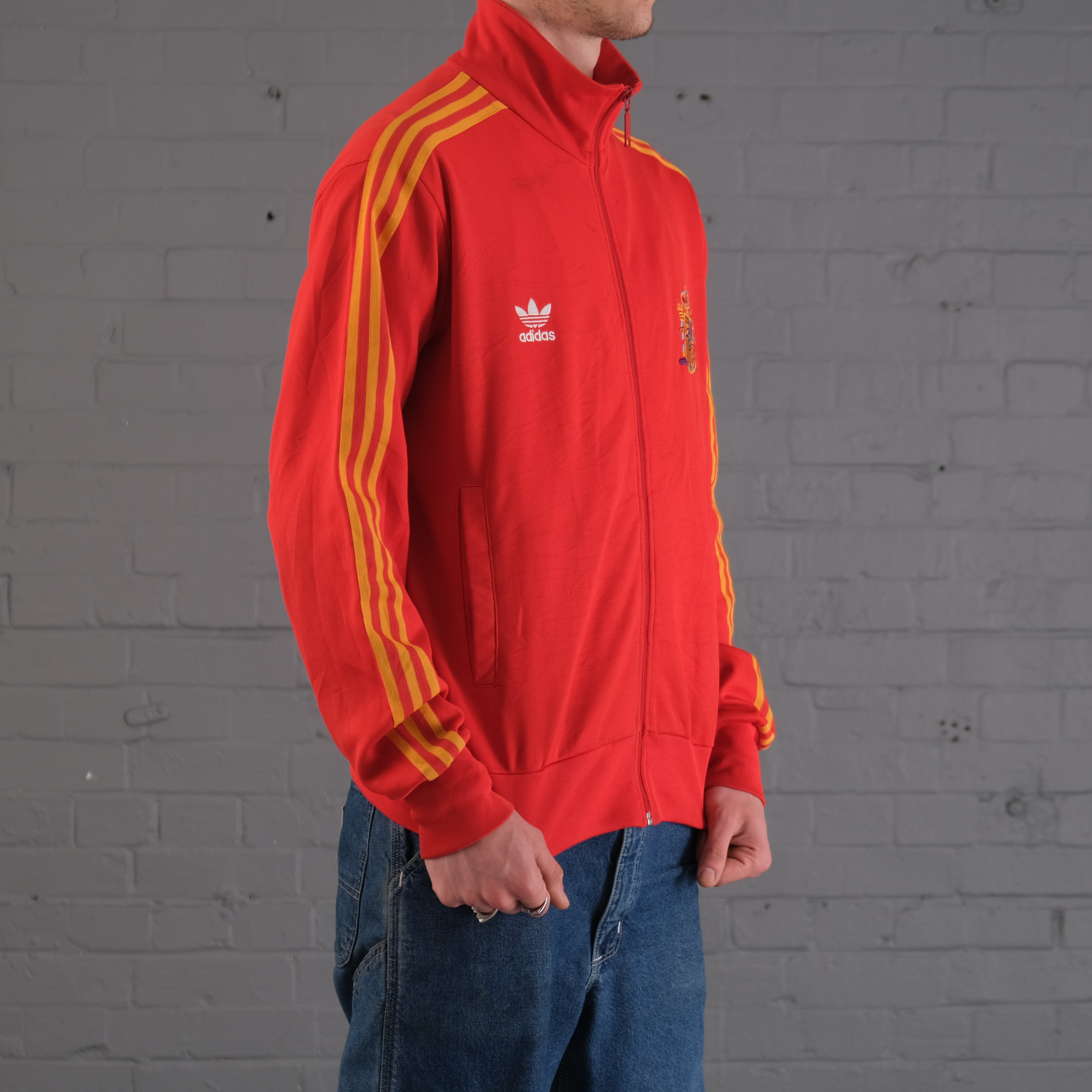 red and yellow adidas tracksuit