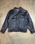 Vintage Leather Bomber Jacket in heavy black leather with collar and plaid lining