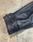 Vintage Leather Bomber Jacket in heavy black leather with collar and plaid lining